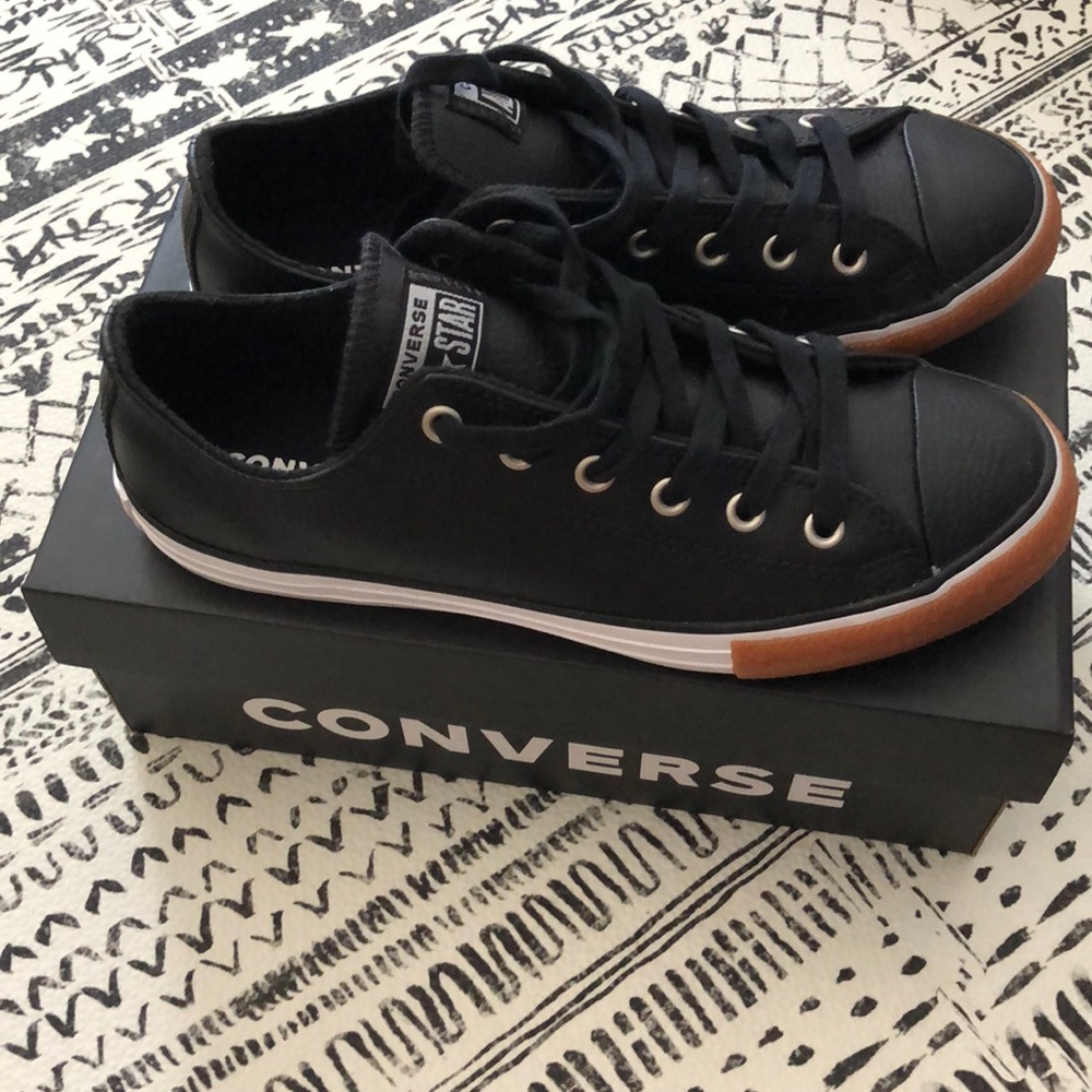 Black leather converse.